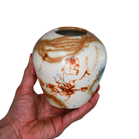 Saggar fired vase with gold leaf