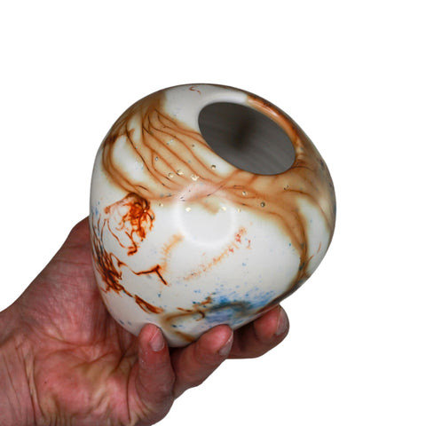 Saggar fired vase with gold leaf